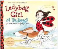 Ladybug girl at the beach